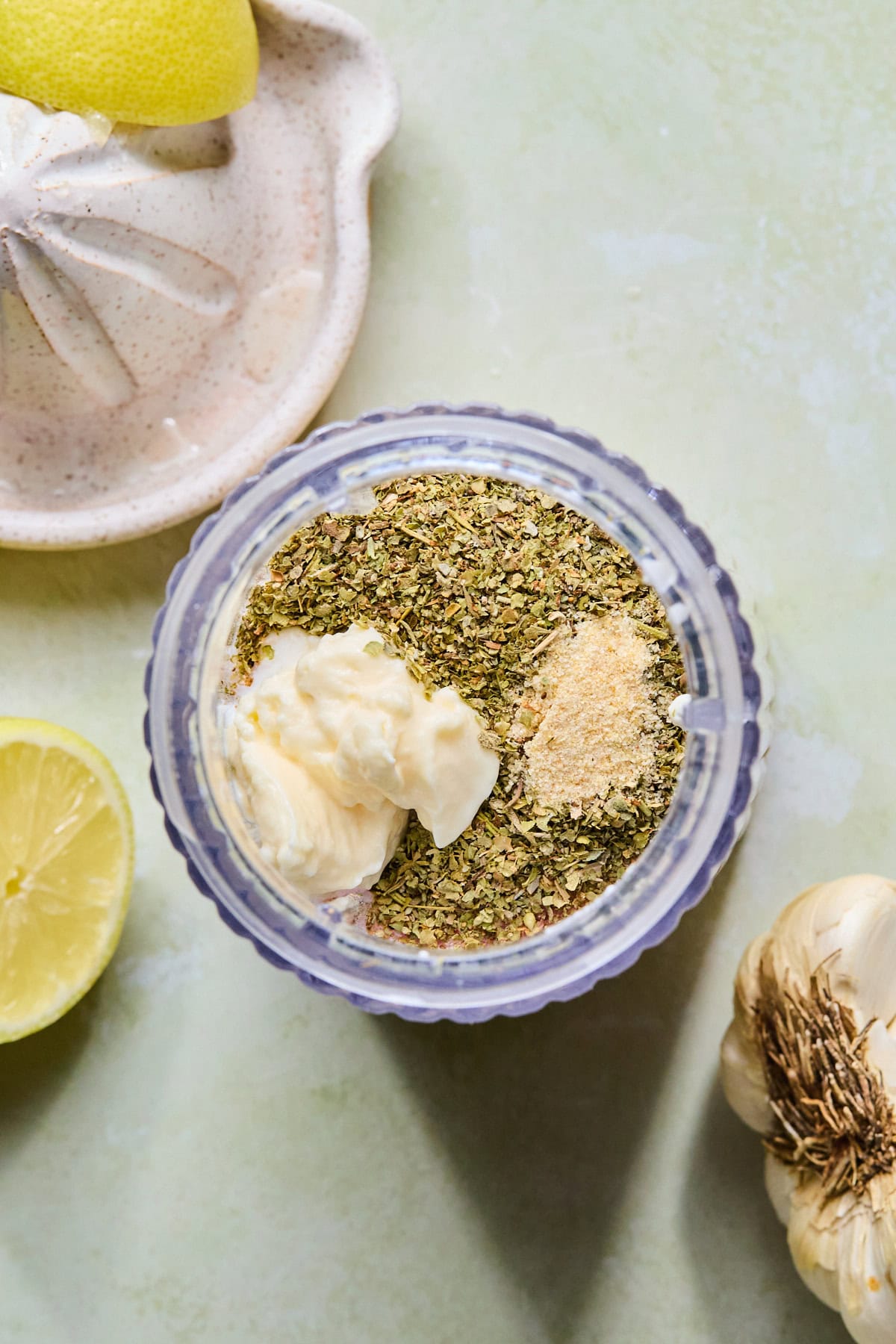 Cottage cheese, mayo, Italian seasoning mix, milk, red wine vinegar, lemon juice, garlic, and onion powder ready to mix into the dressing.