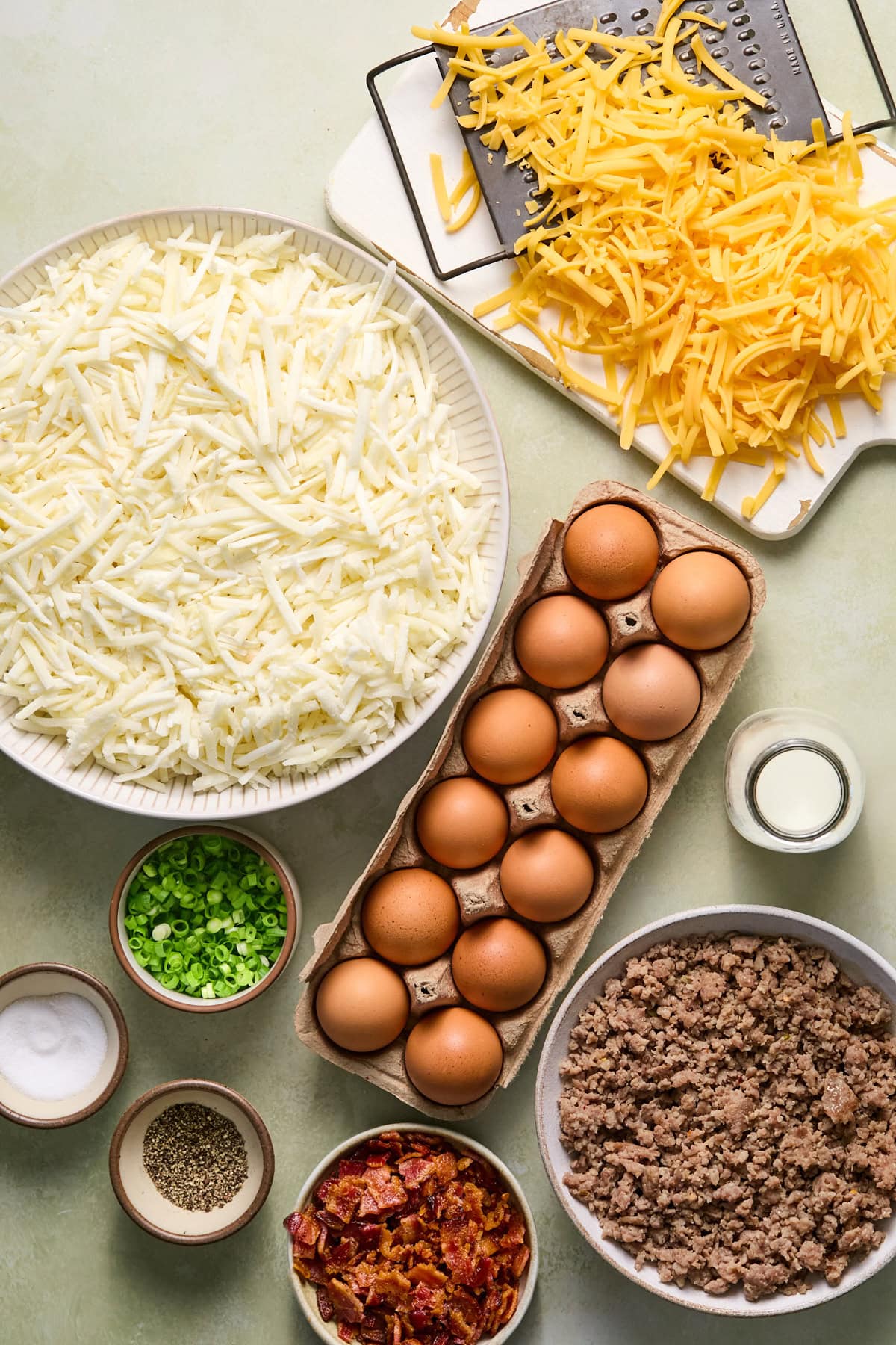 Crockpot breakfast casserole recipe ingredients laid out on a countertop.