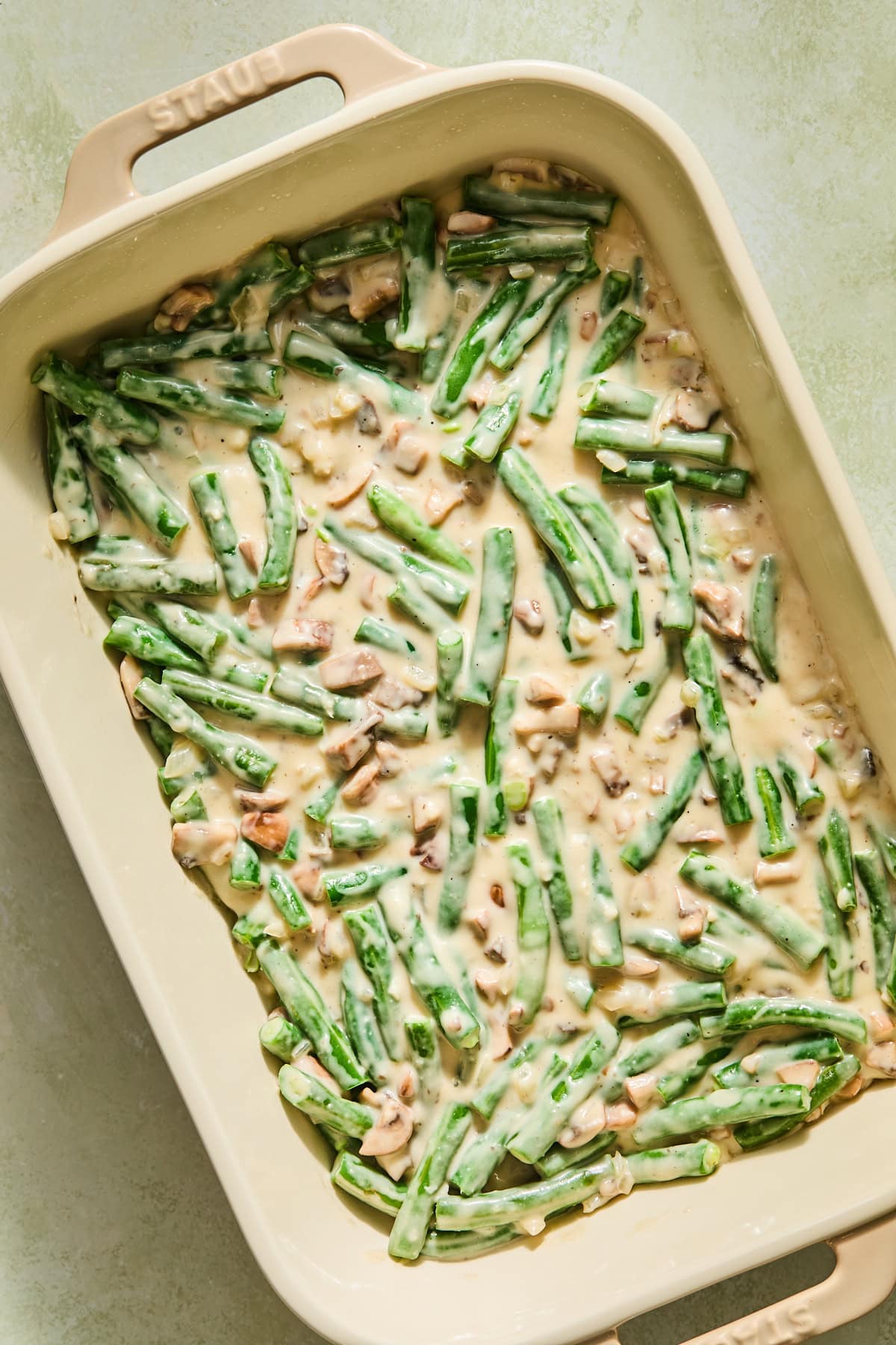 The green beans and sauce transferred to a baking dish before going in the oven.